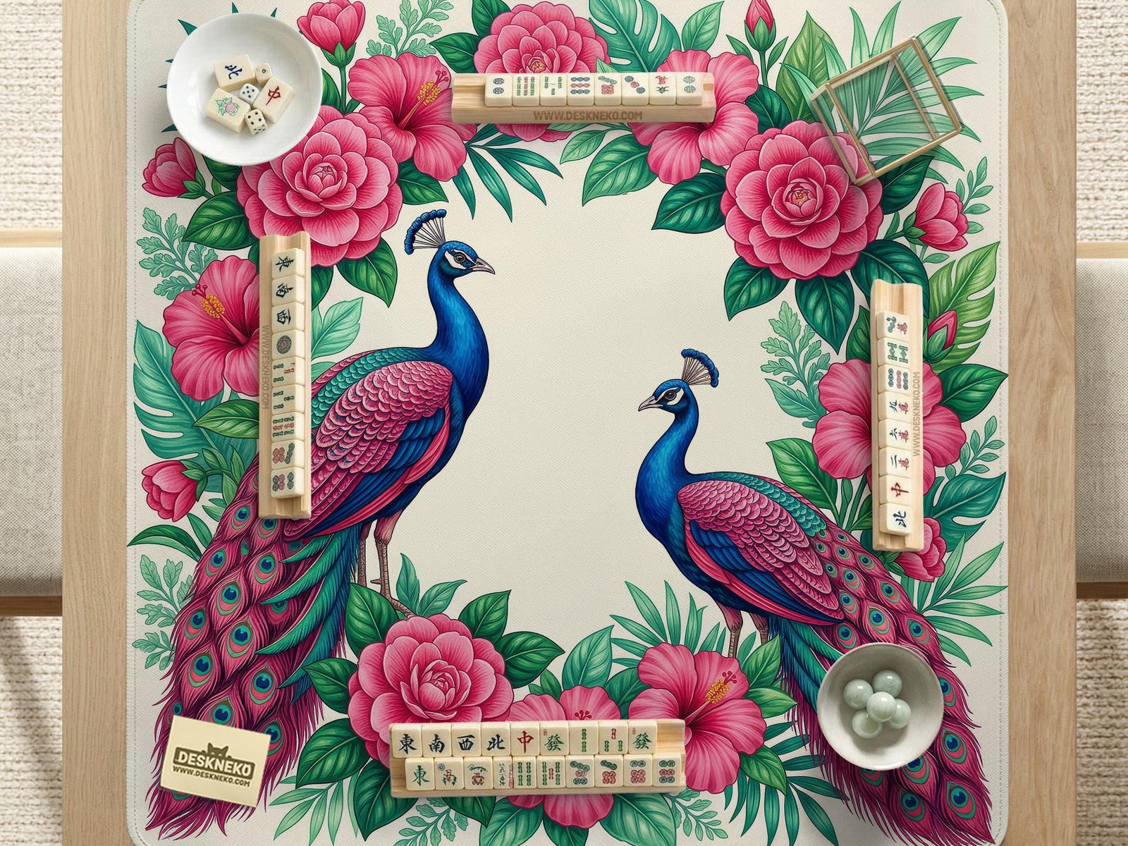 Square mahjong mat with blue peacocks, pink hibiscus flowers, green tropical leaves, and a cream center.