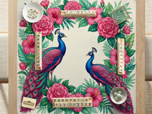 Square mahjong mat with blue peacocks, pink hibiscus flowers, green tropical leaves, and a cream center.