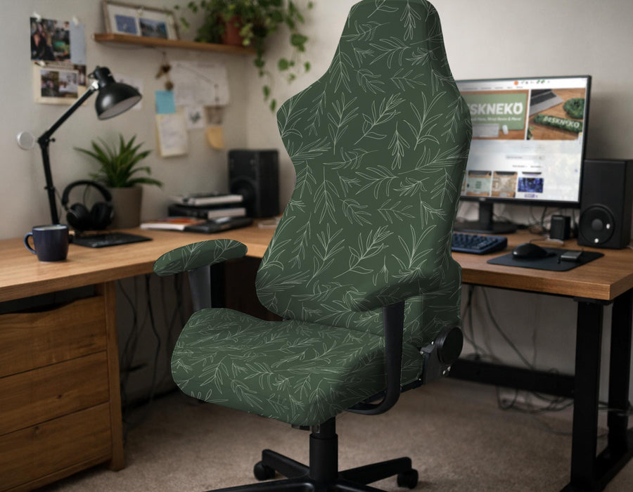 A forest green chair cover with a sage green leaf print shown on a high-back office or gaming chair.