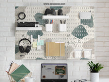 Four square pegboard panels in muted sage green, warm cream, and grey with contour lines and small botanical branch details.
