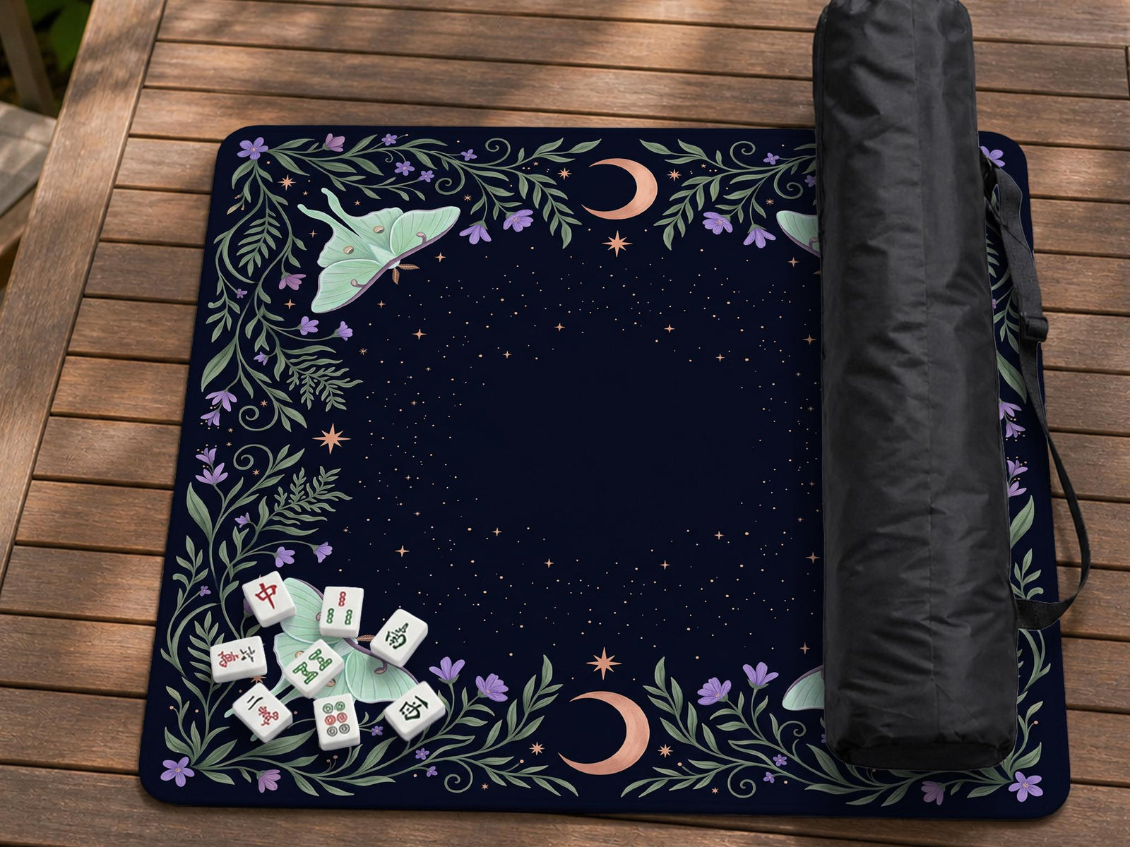 Navy square mahjong mat with a floral border, copper moons, scattered stars, pale moths, and leafy botanical details.