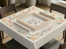 Cream mahjong mat with koi fish, lotus flowers, sage green framing, blush accents, and a striped center with printed rules.