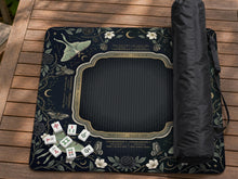 Dark floral mahjong mat with luna moth, moon phases, roses, vines, and small star details.
