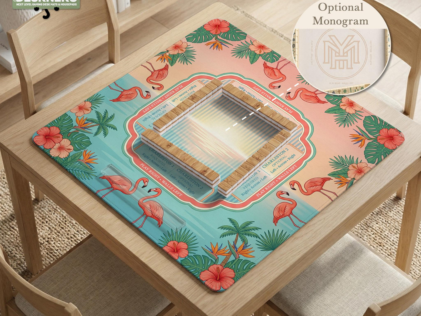 Pink mahjong mat with flamingos, hibiscus flowers, palm leaves, and an aqua lagoon background.
