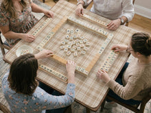 Beige plaid square mahjong mat with a cream tartan pattern.