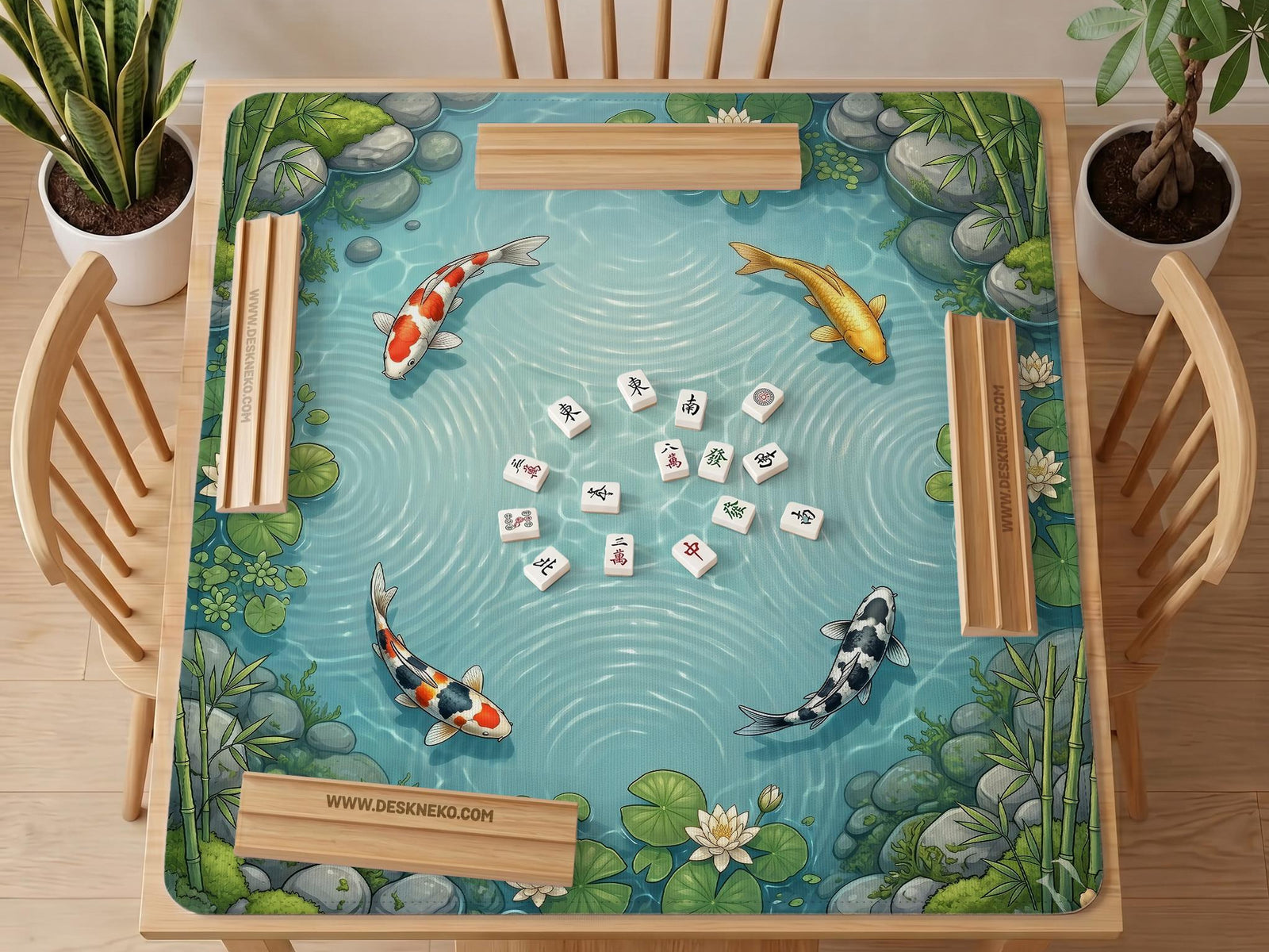 Aqua blue square mahjong mat with koi fish swimming among lotus blooms, green lily pads, and pond water.