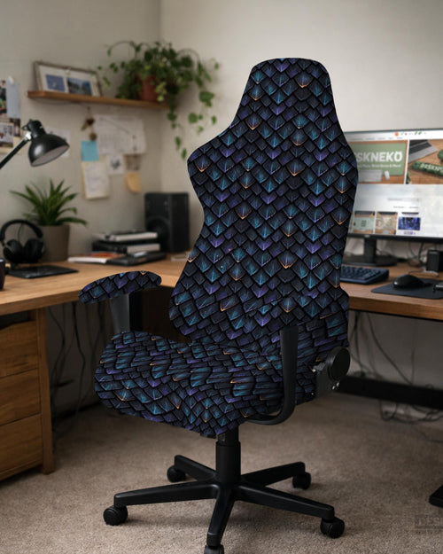 Blue and black chair cover with a dragon scale print in teal, violet, navy, and copper tones.