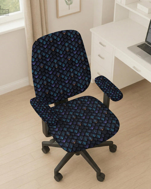 An indigo desk chair cover with a dragon scale pattern in blue, navy, purple, and copper tones, shown as a stretch slipcover with coverage options.
