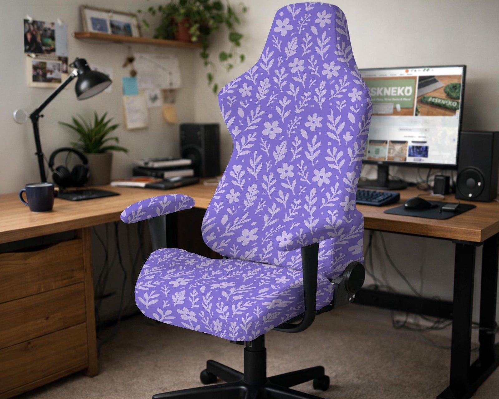 Purple chair cover with a floral print shown on a high back office chair.
