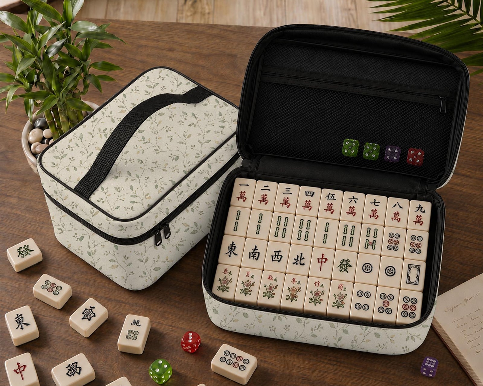 Green Mahjong tile carrier bag with a sage leaf botanical pattern, zipper closure, and top handle.