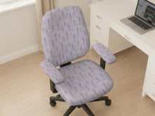 Lavender floral office chair cover with a light neutral background and small purple flower pattern.