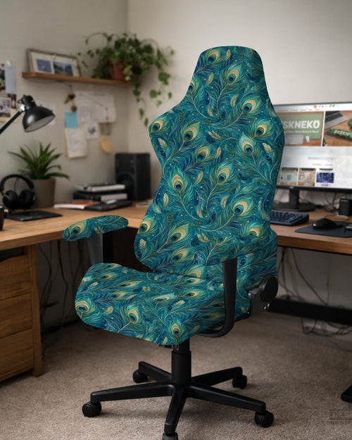 A blue green chair cover with a peacock feather design shown on an office chair with armrests.