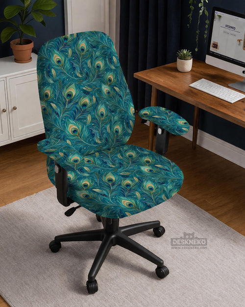 Blue green chair cover with a peacock feather pattern shown on an office chair, with fitted stretch fabric and armrest coverage visible in the listing image.