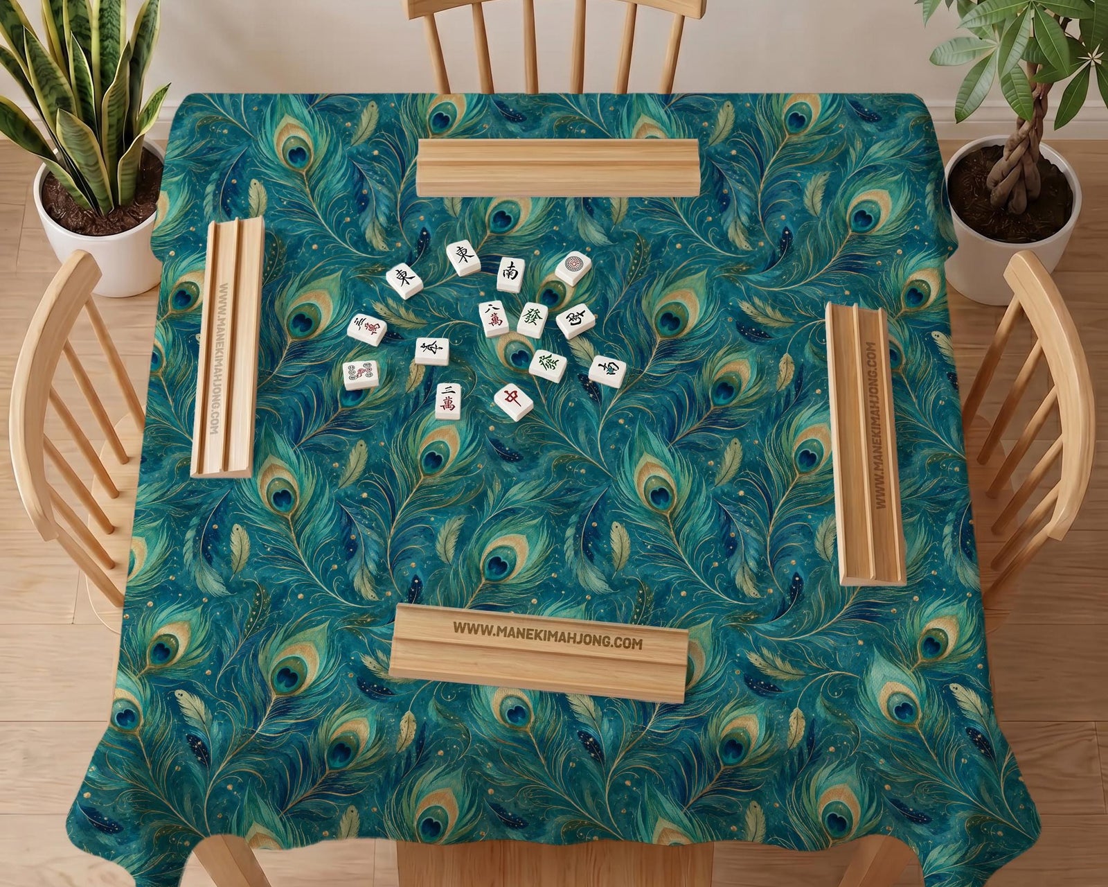 Teal Mahjong tablecloth with a peacock feather pattern and blue green tones shown on a square table.