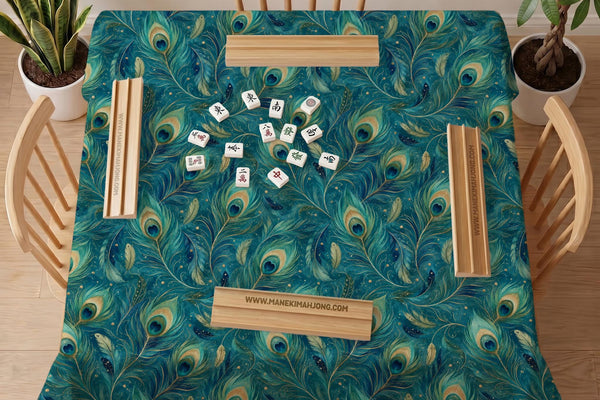 Teal Mahjong tablecloth with a peacock feather pattern and blue green tones shown on a square table.