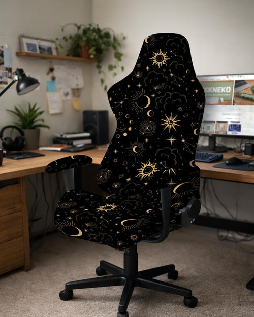 Black chair cover with a gold astrology print of moons, suns, stars, and symbols on a gaming chair.