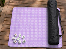 A square lavender mahjong mat with a purple gingham pattern.
