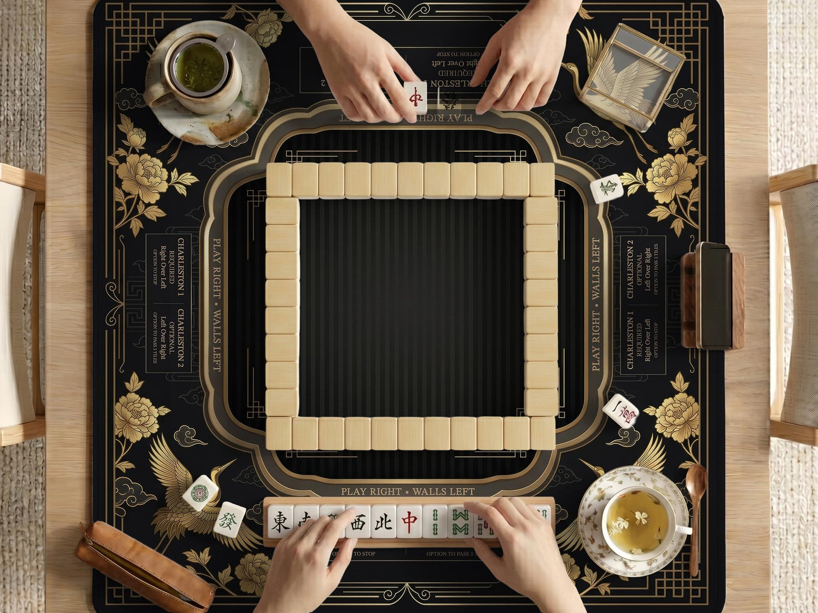 Black and gold square mahjong mat with an art deco crane and floral border, rule reminders around the edges, and a blank center area.