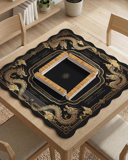 Black mahjong mat with gold dragon artwork, a scalloped edge, and printed Mahjong rules on the surface.