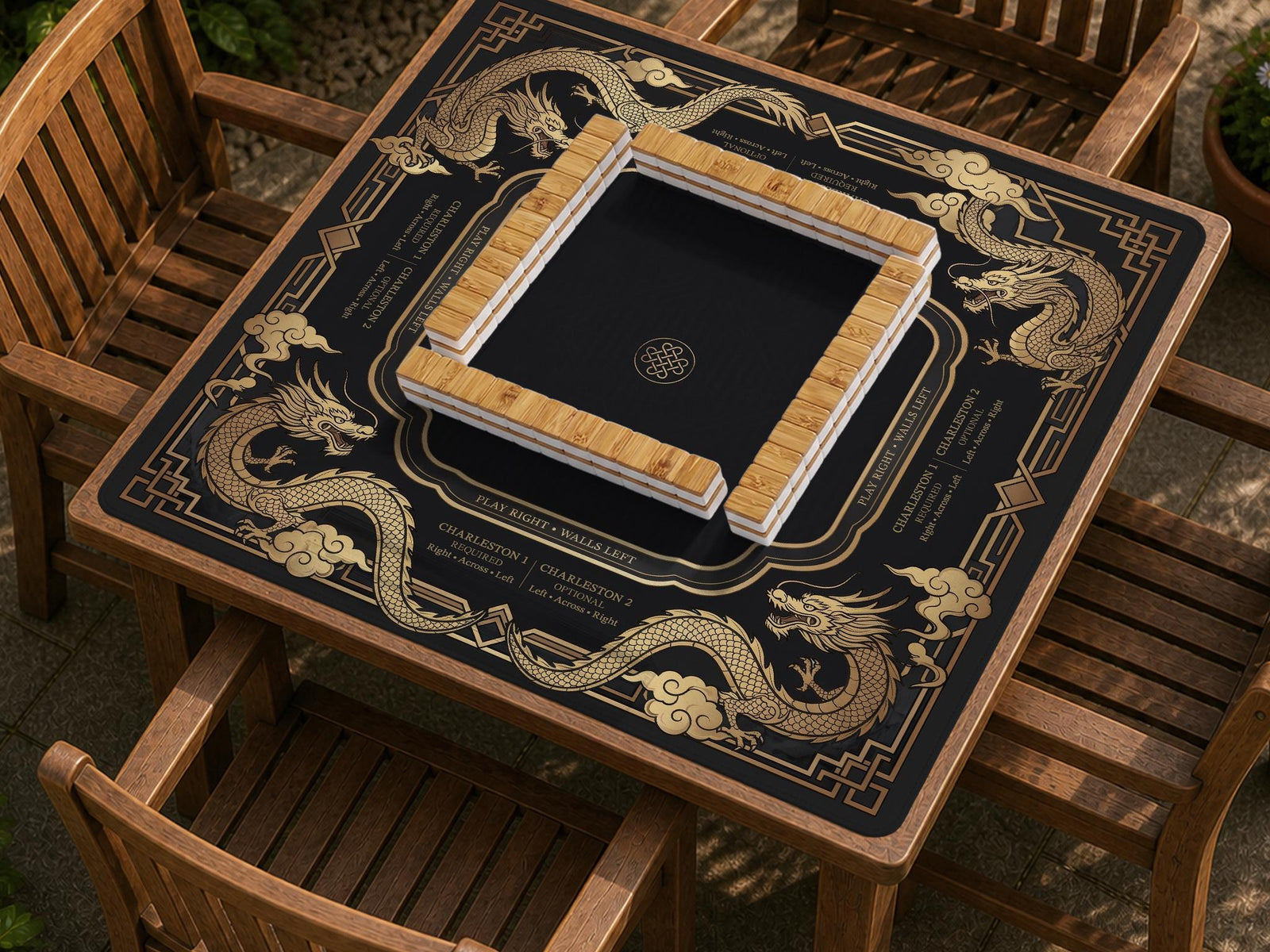 Black mahjong mat with gold dragon artwork, an Art Deco border, and printed Mahjong rules.