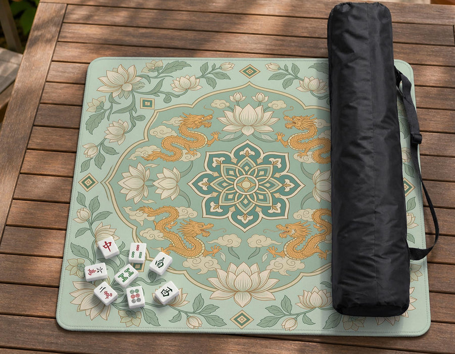 Sage green square mahjong mat with lotus flowers, golden dragons, and an ornamental center design.