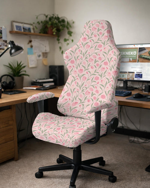 Pink floral stretch chair cover with a tulip pattern shown on a high-back gaming or office chair.