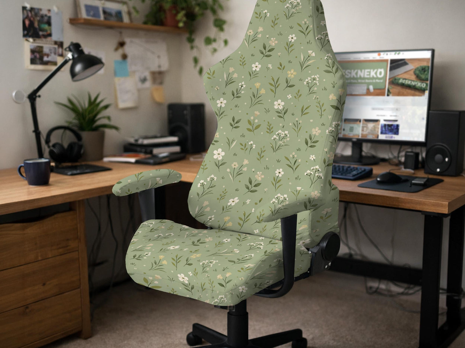 Green chair cover with a sage floral botanical print shown on a high-back gaming chair and office chair.