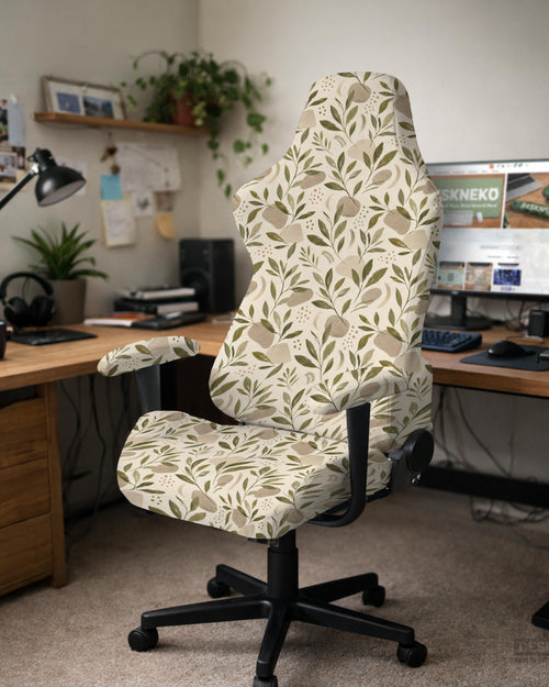 A neutral botanical print chair cover shown on a high back gaming-style office chair with armrests.