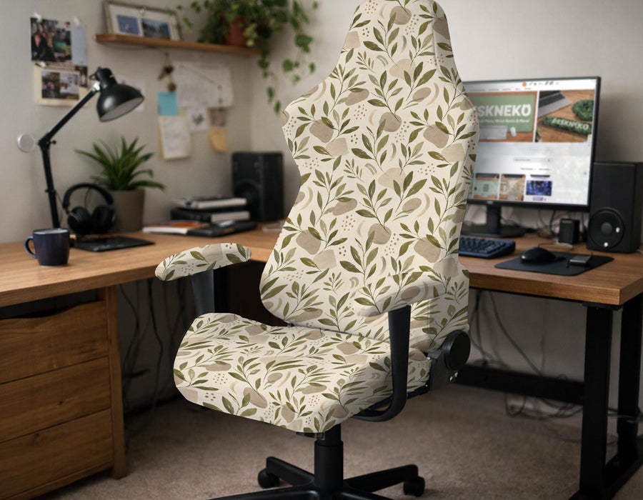 A neutral botanical print chair cover shown on a high back gaming-style office chair with armrests.