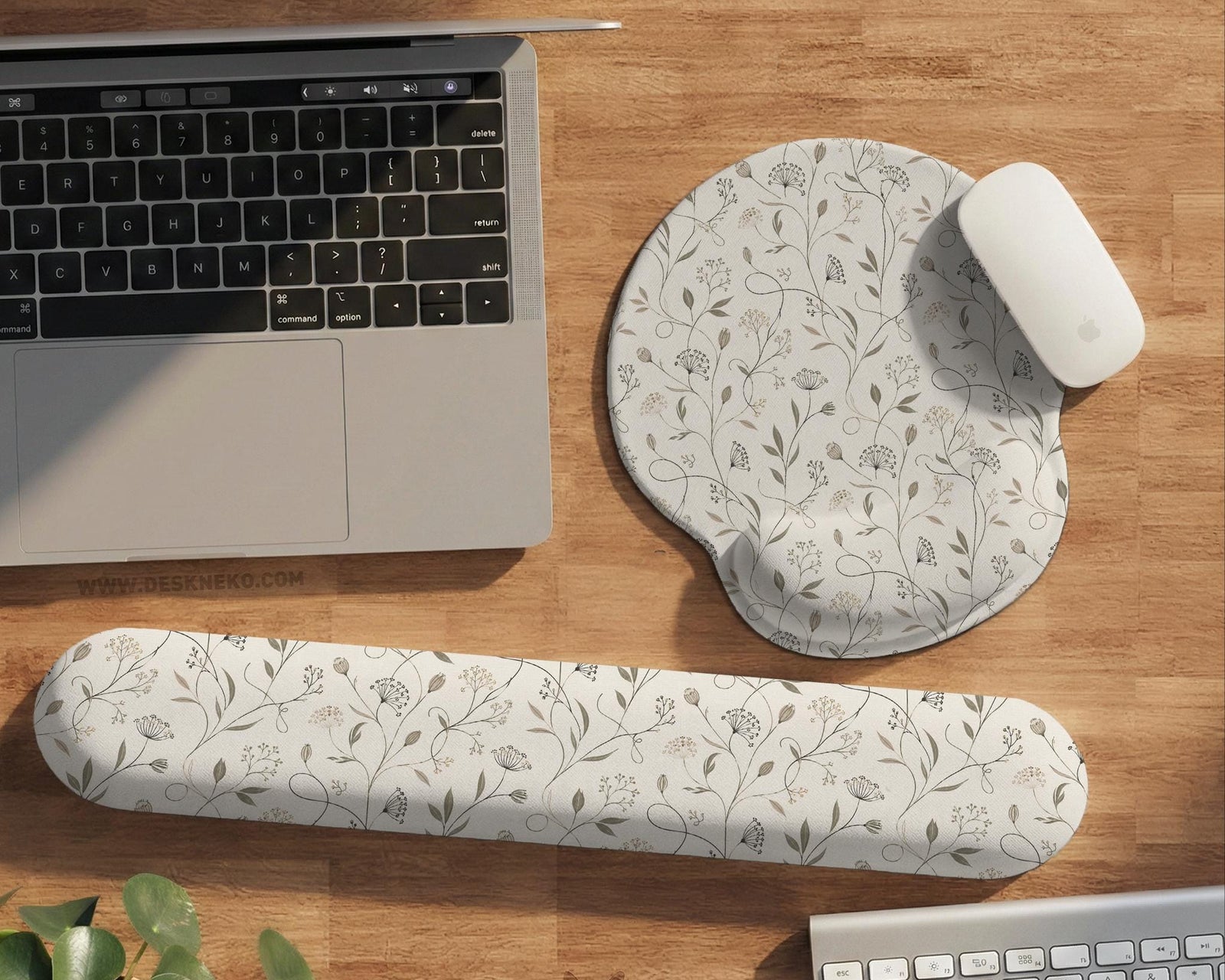 Ivory mouse pad and keyboard wrist rest with delicate wildflower line art in sage, taupe, and cream tones.