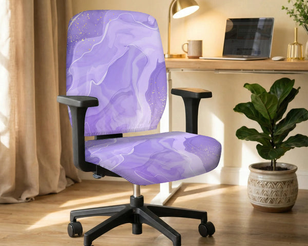 Office chair fitted with a stretch cover in a soft lavender marble swirl print with gold flecks, shown in a home office