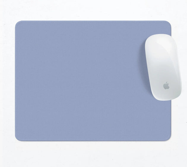 Solid periwinkle blue mousepad with a stitched edge, shown with a white mouse