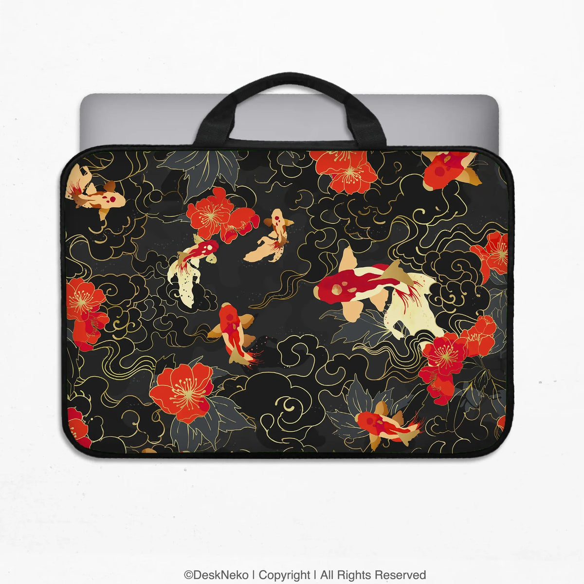 Padded koi fish laptop sleeve with black carry handles, printed with red, white and gold koi and red blossoms on a black and gold pattern, holding a laptop