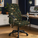 Office chair fitted with a stretch cover in a dark green botanical print with cream and orange wildflowers, butterflies and a bee, shown in a home office
