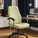 Office chair fitted with a stretch cover in a cream print scattered with small sage-green daisies, shown in a home office