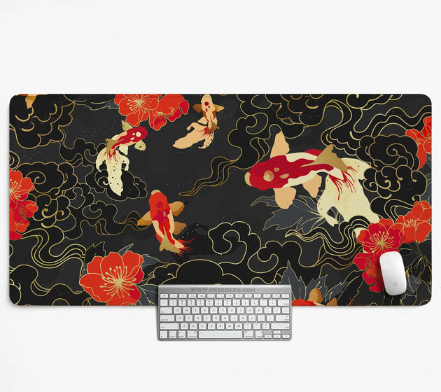Koi fish desk mat with red, white and gold koi swimming among black and gold swirling clouds and red blossoms, shown under a keyboard and mouse