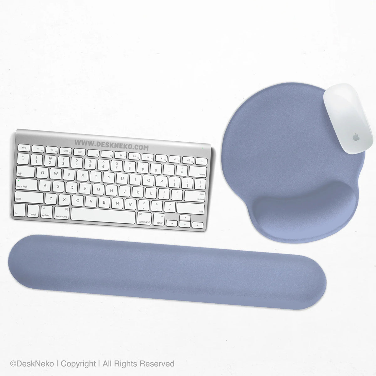 Soft periwinkle-blue ergonomic set with a round gel mouse pad and a keyboard wrist rest in a plain color, shown with a keyboard and mouse