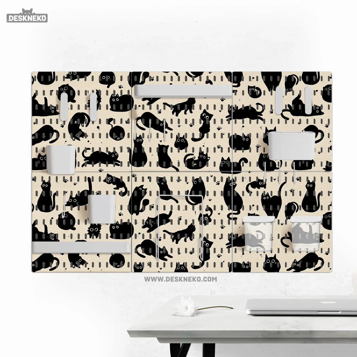 Pegboard wall organizer set printed with playful black cat silhouettes and paw prints on a cream background, fitted with white shelves, cups and hooks