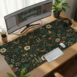 Dark floral cottagecore desk mat with botanical butterflies