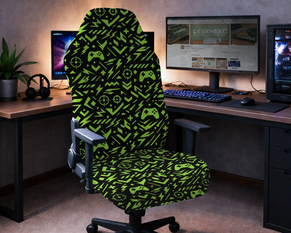 Gaming chair fitted with a black stretch cover printed with neon green game controllers, crosshairs and lightning bolts, shown in a gaming setup
