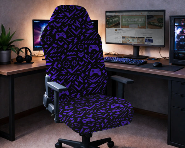 Gaming chair fitted with a black stretch cover printed with purple game controllers, crosshairs and lightning bolts, shown in a gaming setup