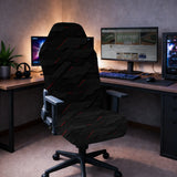 Gaming chair fitted with a black stretch cover in a 3D tech geometric pattern with red accent lines, shown in a gaming setup