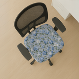 Blue Hydrangea Drift seat-only cover on a mesh-back chair; mesh back and armrests stay bare.