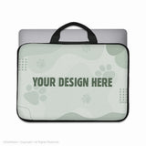 Custom laptop sleeve with carry handles and a laptop inside, shown as a blank sage-green personalizable template with a 'your design here' placeholder
