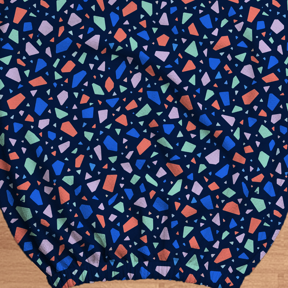 Electric Terrazzo fabric and elastic detail; selected cover option only, chair not included.