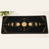 Moon Phases desk mat with black stitched edges