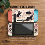 Switch case with black cats and cherry blossoms on a light pastel background.