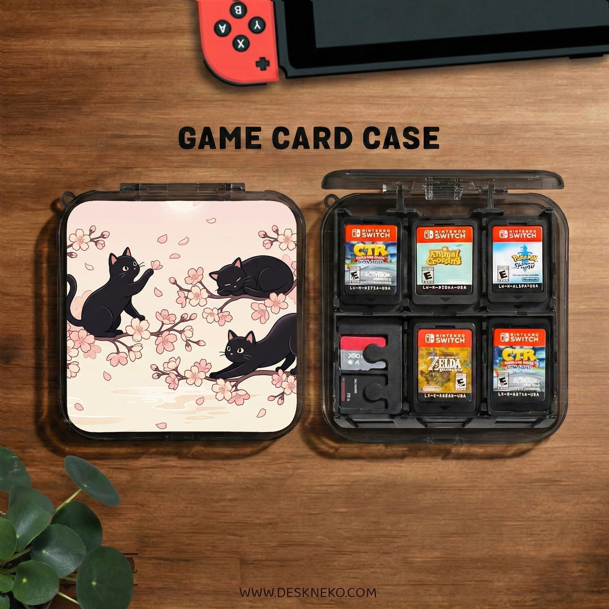 Switch case with black cats and cherry blossoms on a light pastel background.