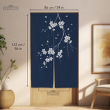 Navy door curtain with pink cherry blossom branches and a light floral layout on a dark background.