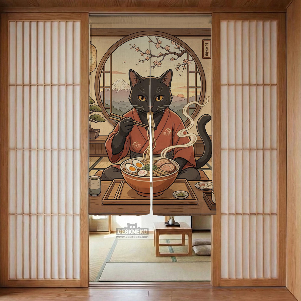 A decorative door curtain with a black cat design, cherry blossoms, and warm neutral background tones.